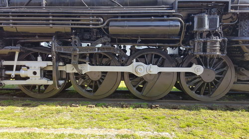 Cropped image of old-fashioned train on railroad tracks