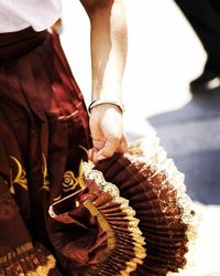 Close-up of woman wearing shoes