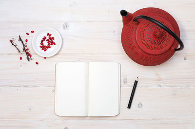 High angle view of red wine on table