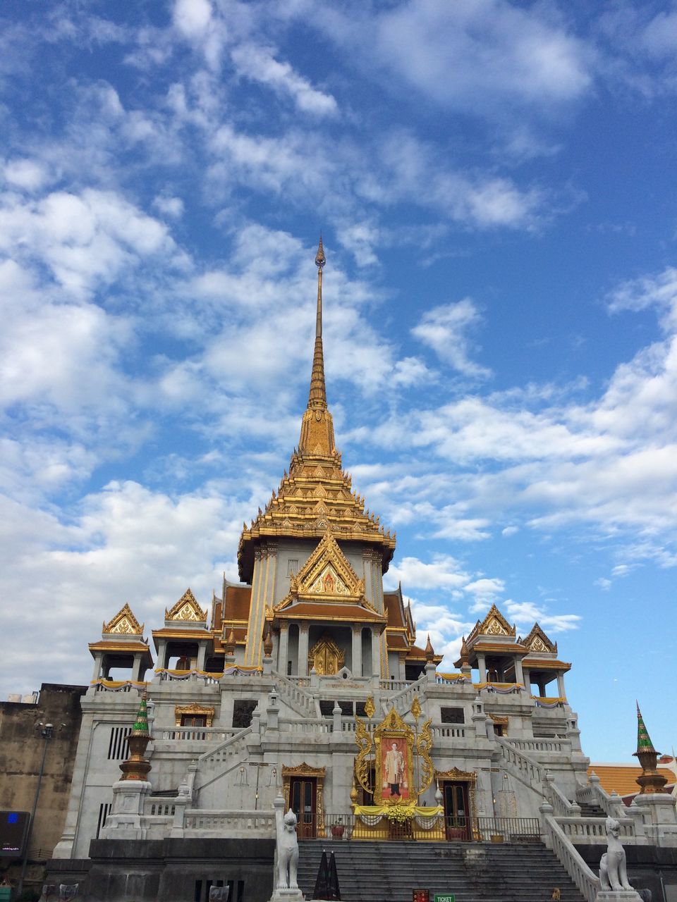 sky, religion, architecture, place of worship, cloud - sky, building exterior, pagoda, travel destinations, gold colored, tourism, spirituality, gold, outdoors, no people, cityscape, day