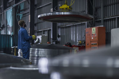 Worker working in steel factory