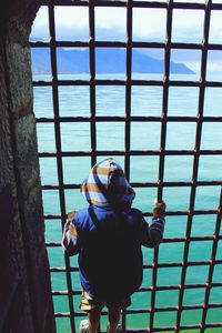 Woman standing against sky