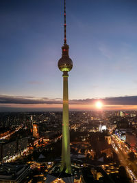 View of communications tower at sunset