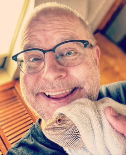 Portrait of smiling man at home