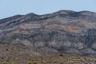 Scenic view of rocky mountains against clear sky