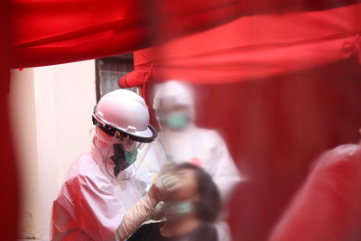 Close-up of doctors examining patient