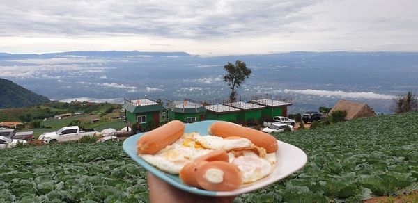 Panoramic shot of food on table against sky