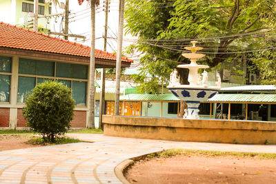 Street by building and trees