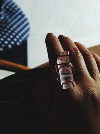 Close-up of hand wearing ring