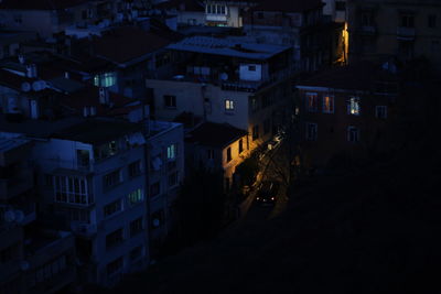 High angle view of illuminated buildings at night