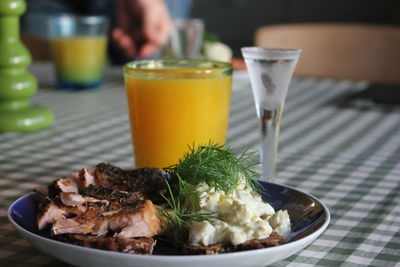 Close-up of drink served on table