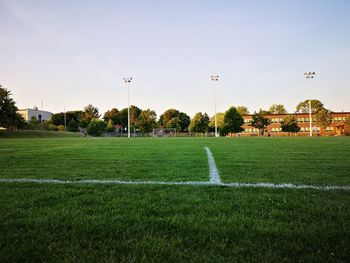 Scenic view of soccer field against sky