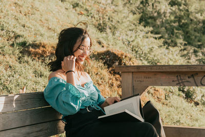 Woman sitting on bench