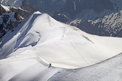 Scenic view of snow covered mountains