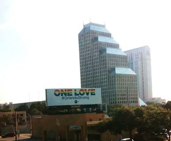 Low angle view of office building against sky