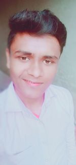 Close-up portrait of a smiling man