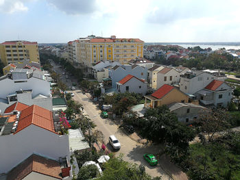 High angle view of street amidst buildings in city