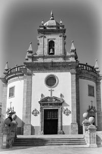 Low angle view of statue against sky