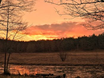 Scenic view of dramatic sky over landscape