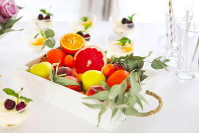 High angle view of fruits in plate on table