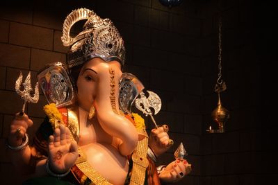 Close-up of ganesha statue in temple