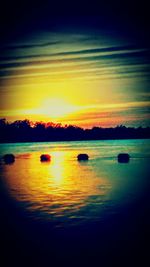 Scenic view of sunset over river