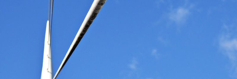 Low angle view of rope against sky