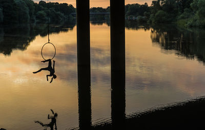 Woman doing acrobatics out in nature