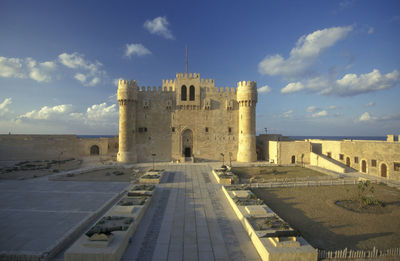 Buildings in city against sky