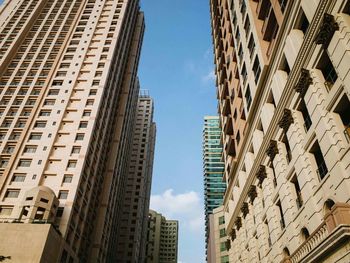 Low angle view of modern building against sky