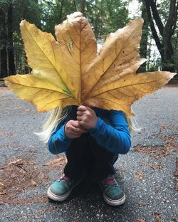 Full length of boy in park during autumn