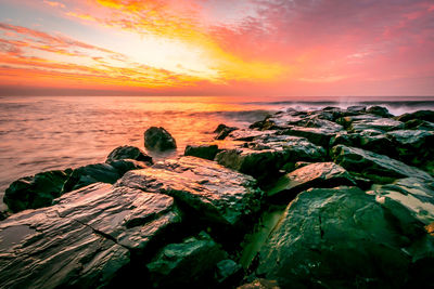 Scenic view of sea during sunset