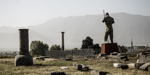 Statue against sky in pompei