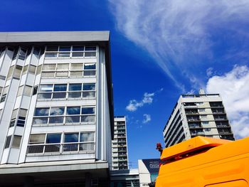 Low angle view of office building against sky