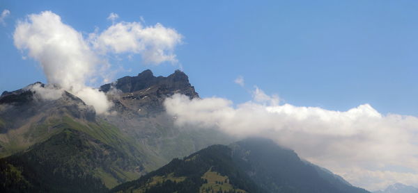 Panoramic view of majestic mountains against sky