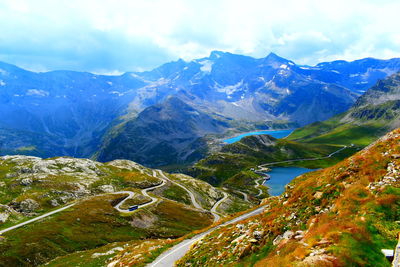 Scenic view of snowcapped mountains against sky