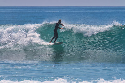 Man surfing in sea