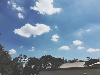 Low angle view of building against blue sky