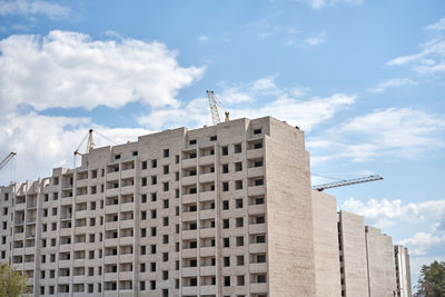 Low angle view of building against sky in city