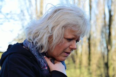 Close-up of senior woman looking down