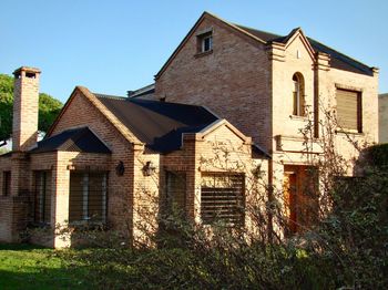 Low angle view of old building against clear sky