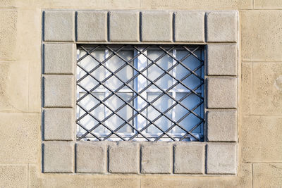 Close-up of metal grate on window