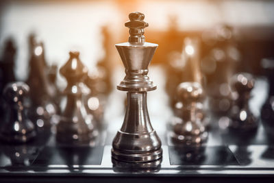 Close-up of chess pieces on board