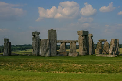 Built structure on field against sky