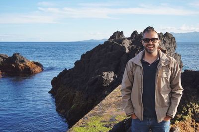 Happy tourist on the seashore