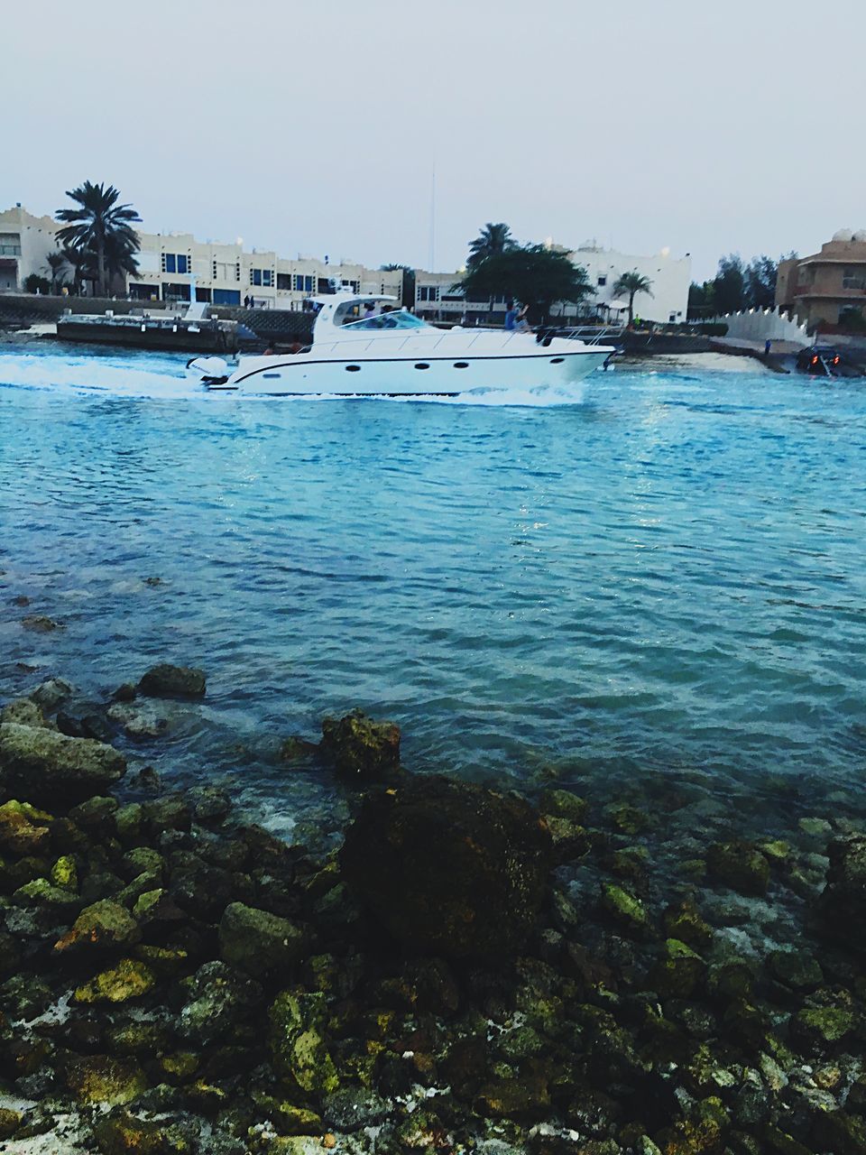 water, sea, nautical vessel, outdoors, no people, transportation, day, nature, architecture, building exterior, built structure, tree, beach, sky