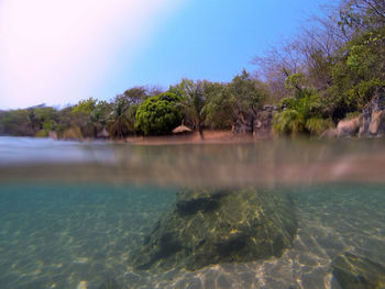 Scenic view of sea against clear sky