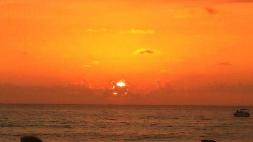 Scenic view of sea at sunset