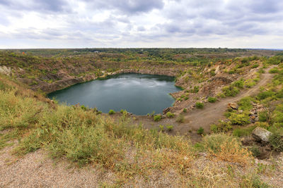 Scenic view of land against sky