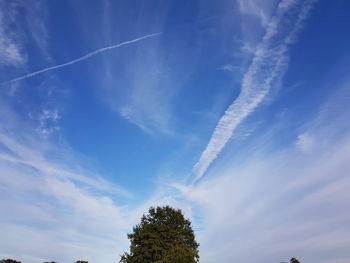 Low angle view of vapor trail in sky